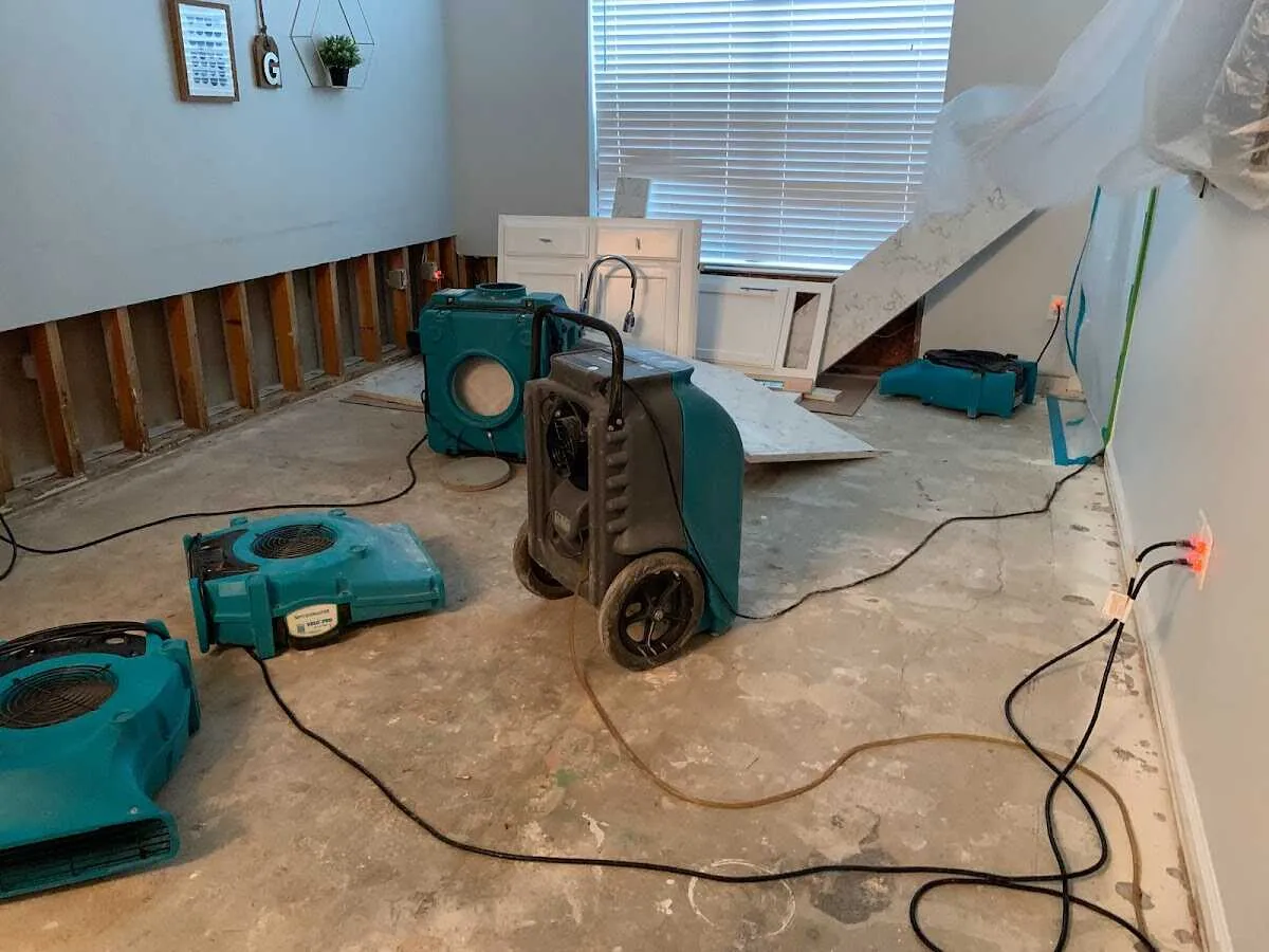 Dehumidifier in flood-cut room for Water Damage Restoration in Bellefontaine